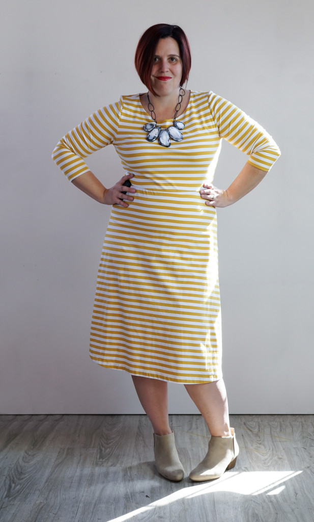 outfit inspiration: one dress, thirty ways: striped midi dress and black and white statement necklace