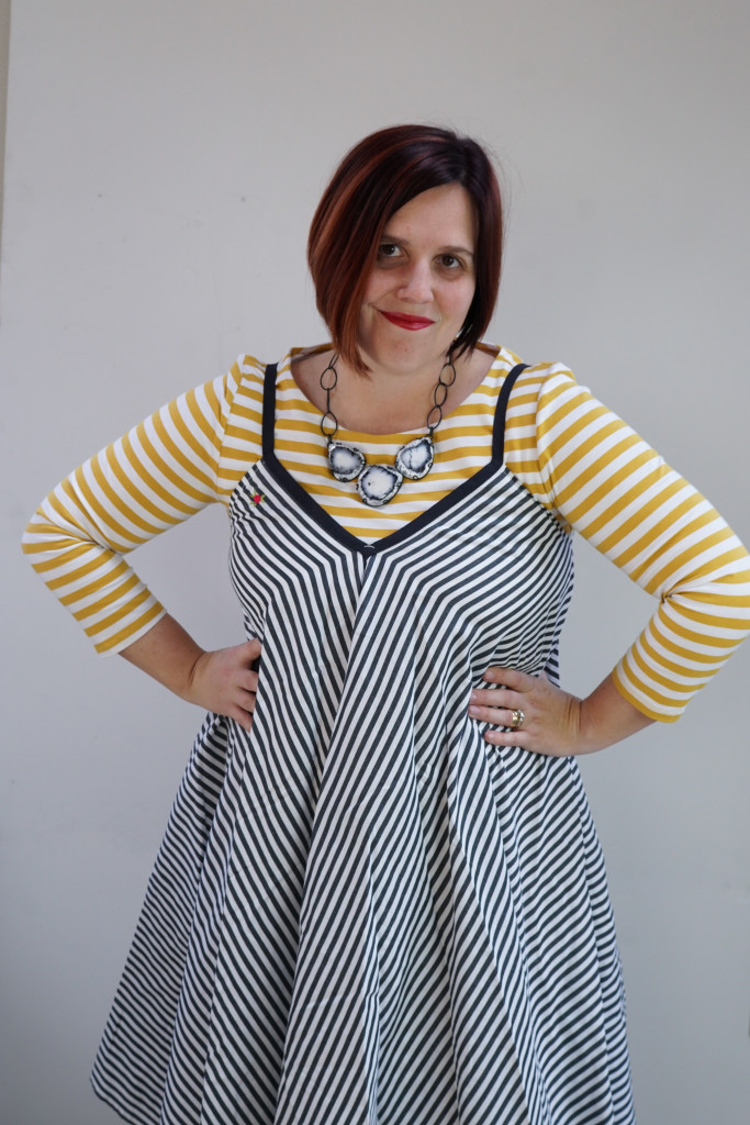 creative outfit inspiration, one dress, thirty ways: striped dress over striped dress with statement necklace