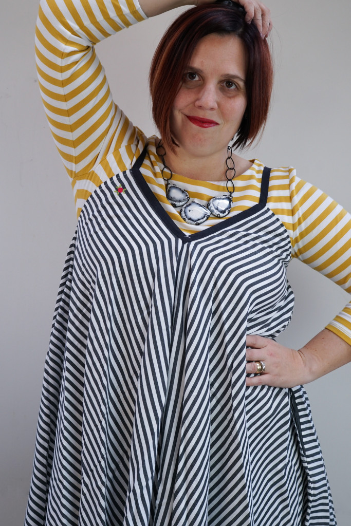 creative outfit inspiration, one dress, thirty ways: striped dress over striped dress with statement necklace