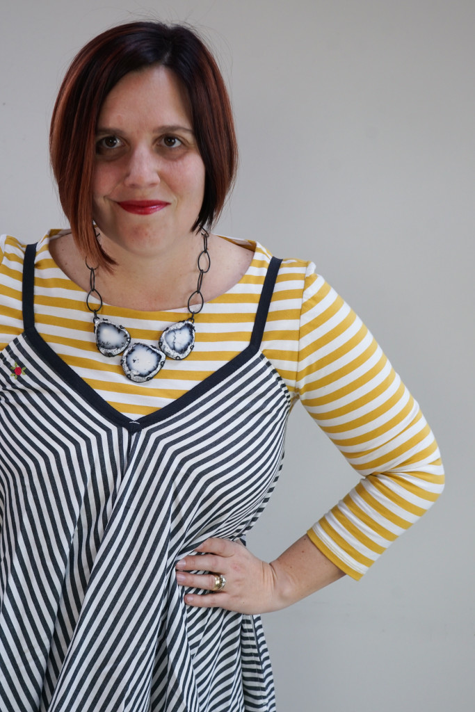 creative outfit inspiration, one dress, thirty ways: striped dress over striped dress with statement necklace
