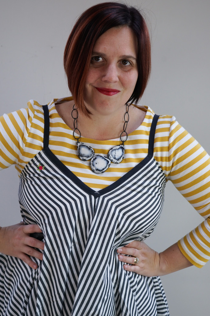 creative outfit inspiration, one dress, thirty ways: striped dress over striped dress with statement necklace
