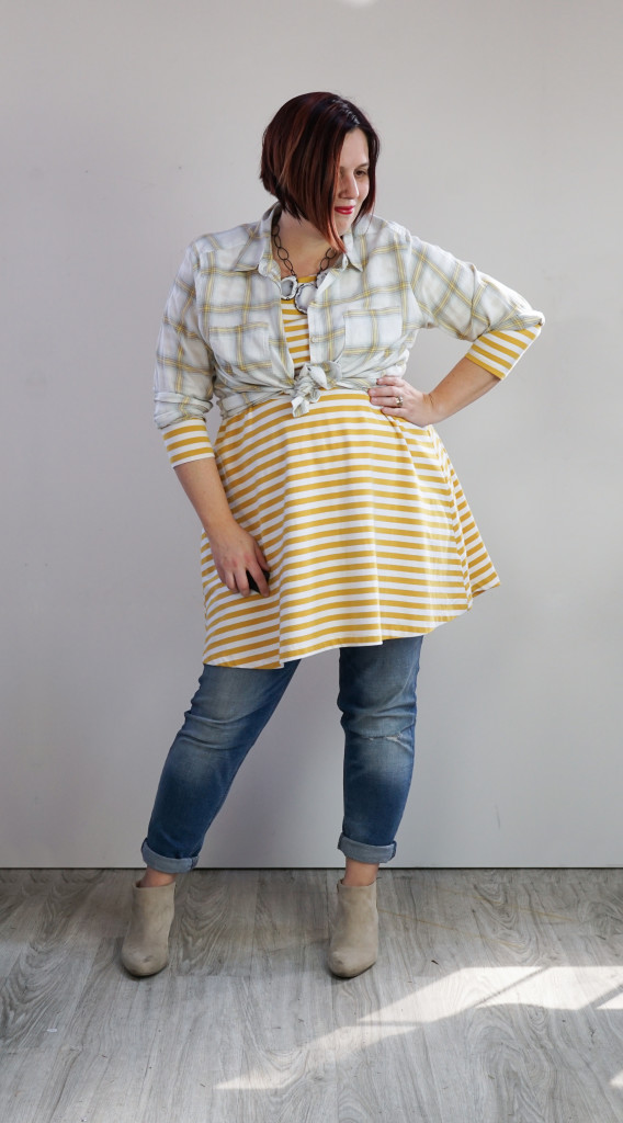 creative outfit ideas: plaid shirt and striped dress over jeans