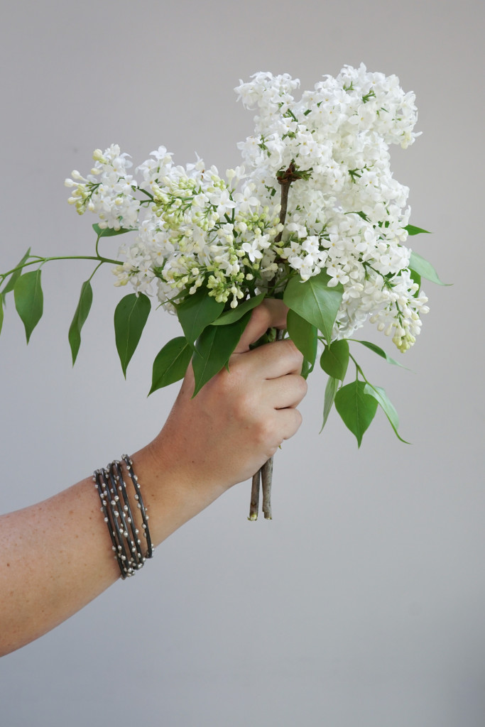 white lilacs and silver on steel stacking bracelets