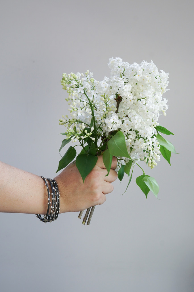 white lilacs and silver on steel stacking bracelets