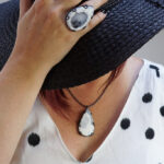 straw hat + statement ring