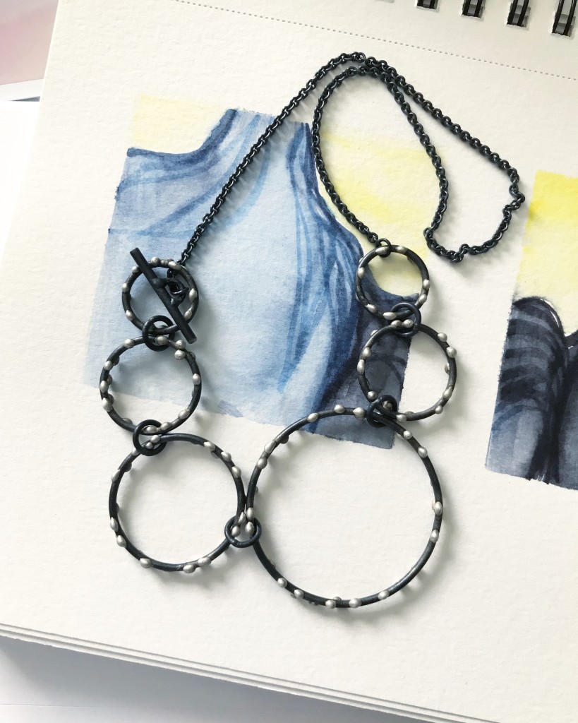 art jewelry on a recent watercolor painting