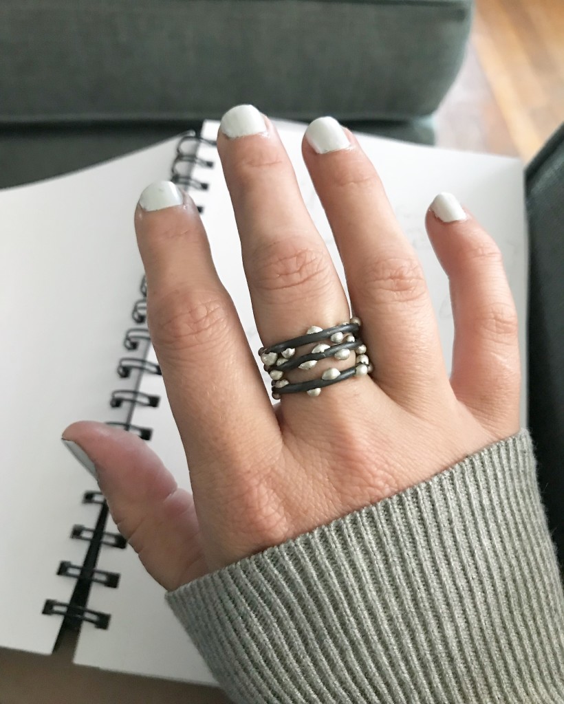cozy fall style: grey sweater and silver on steel stacking rings