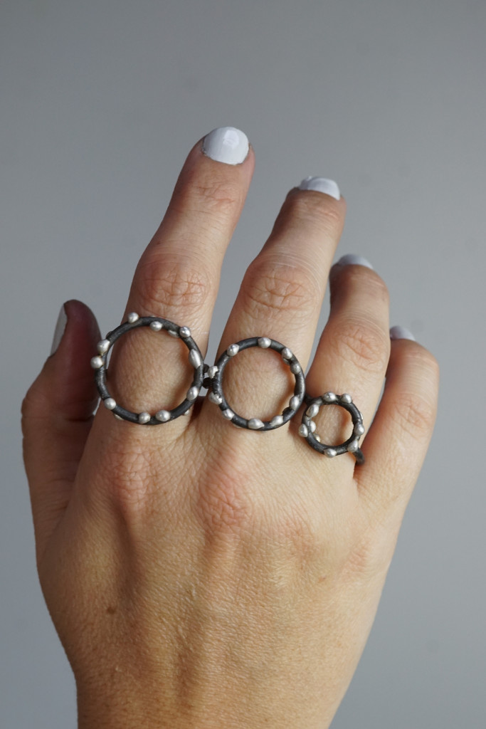 small, medium, and large handmade mixed metal silver on steel circle rings