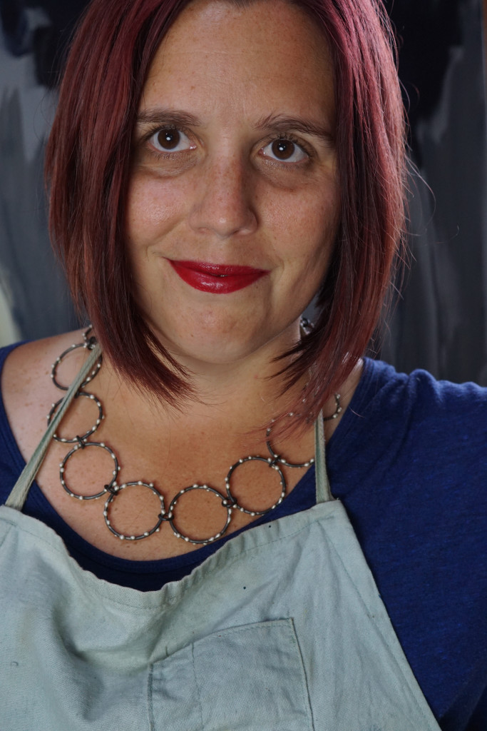 artist studio style: wearing a handcrafted statement necklace with my painting apron