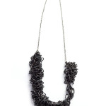 a tangle of chain: steel and silver statement necklace