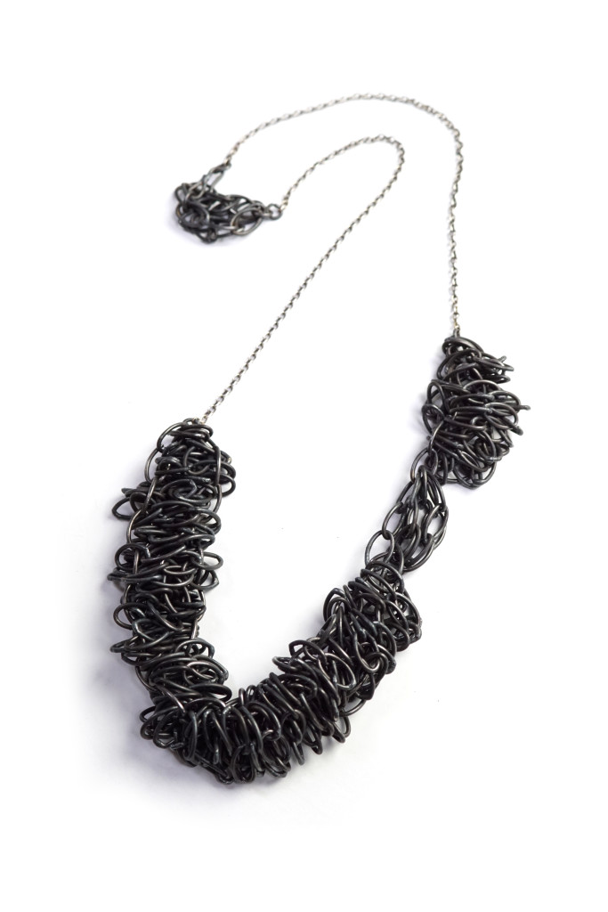 steel and silver handmade chain link statement necklace #artjewelry #contemporaryjewelry