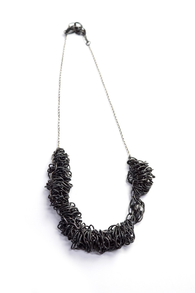 steel and silver handmade chain link statement necklace #artjewelry #contemporaryjewelry