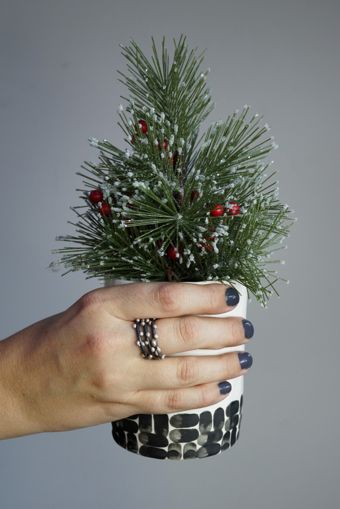 handmade holiday decor: faux tree in black and white handmade ceramic cup (with mixed metal silver on steel stacking rings)