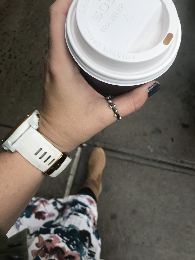 street style: thumb ring, floral midi skirt, and boots