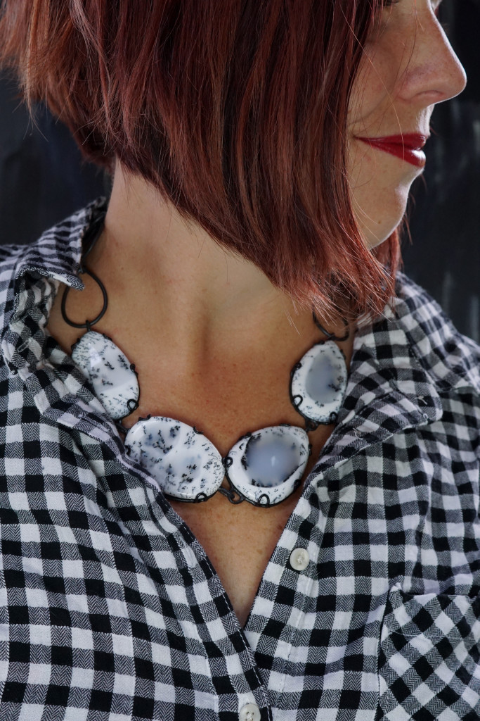 fall winter holiday style: black and white plaid shirt with black and white chunky gemstone statement necklace