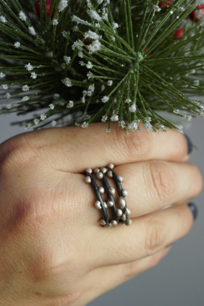 tiny faux christmas tree and handmade mixed metal stacking rings