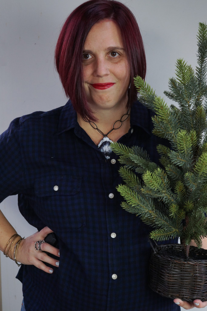 casual fall holiday style: black and navy plaid shirt with chunky gemstone statement necklace