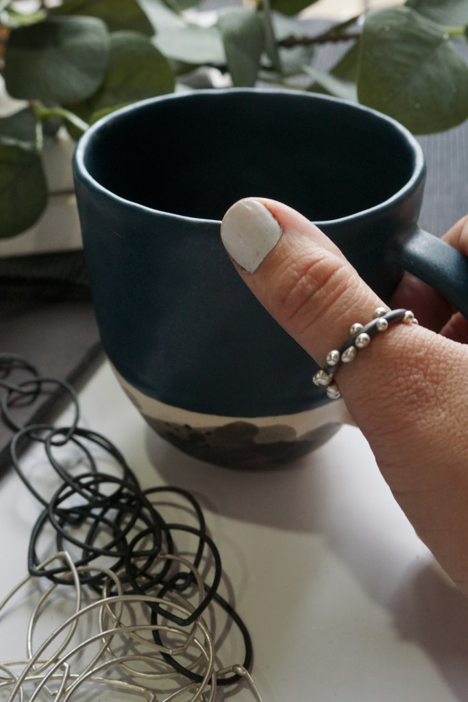 artist maker morning: handmade ceramic tea cup, mixed metal chain link statement necklace, handmade silver on steel thumb ring