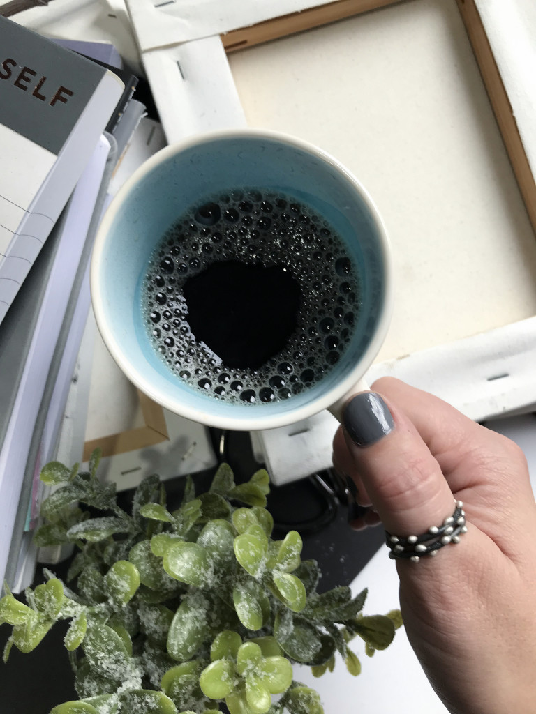 handmade mixed metal stacking thumb rings with handmade ceramic mug