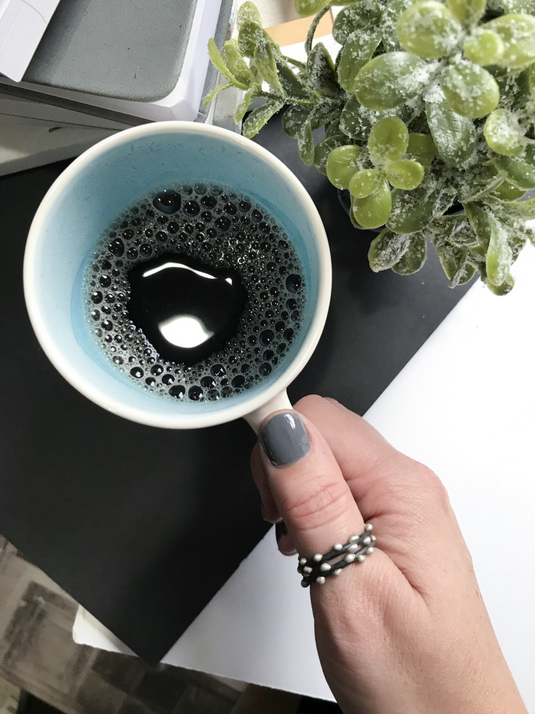 handmade mixed metal stacking thumb rings with handmade ceramic mug