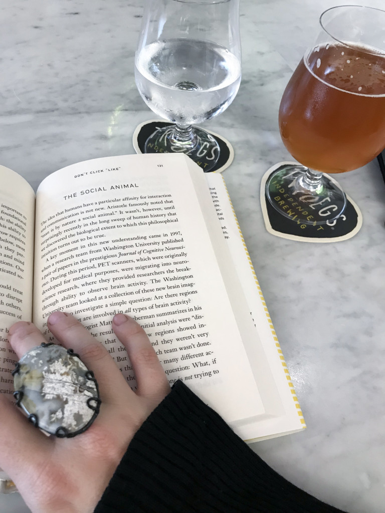 crazy lace agate gemstone statement ring with book and beer