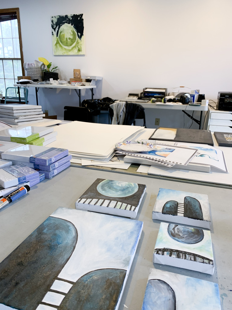 abstract paintings in artist and maker megan auman's studio