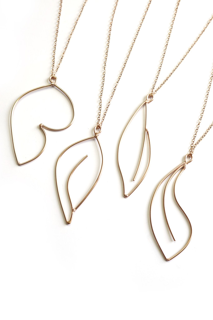 bronze necklaces inspired by minimal floral tattoos, Mattise,  and Georgia O'Keeffe