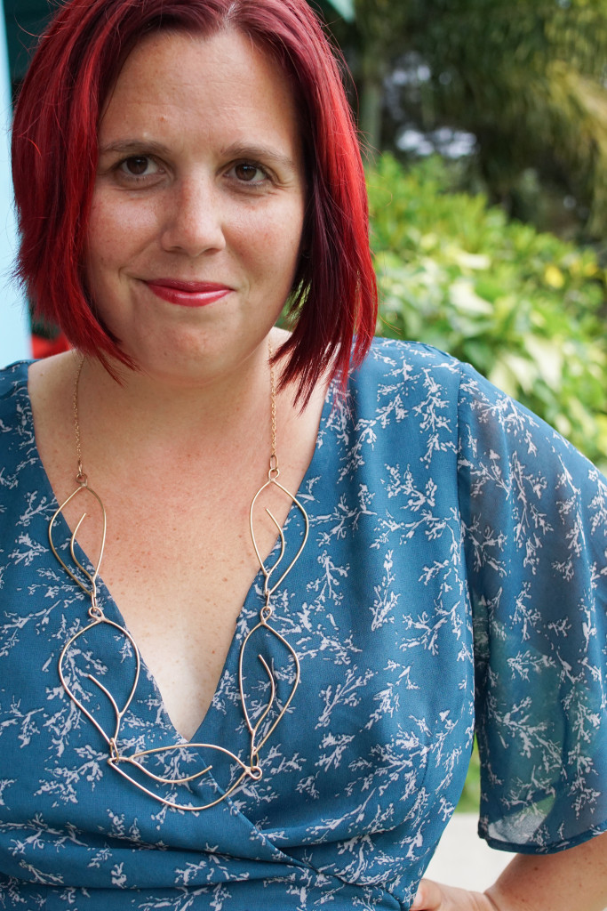 Matisse-inspired bronze necklace with green dress