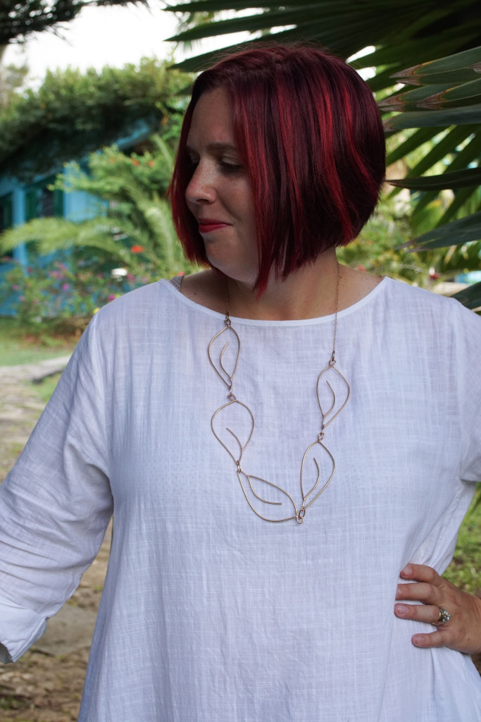 unique handmade necklace white dress tropical gardens