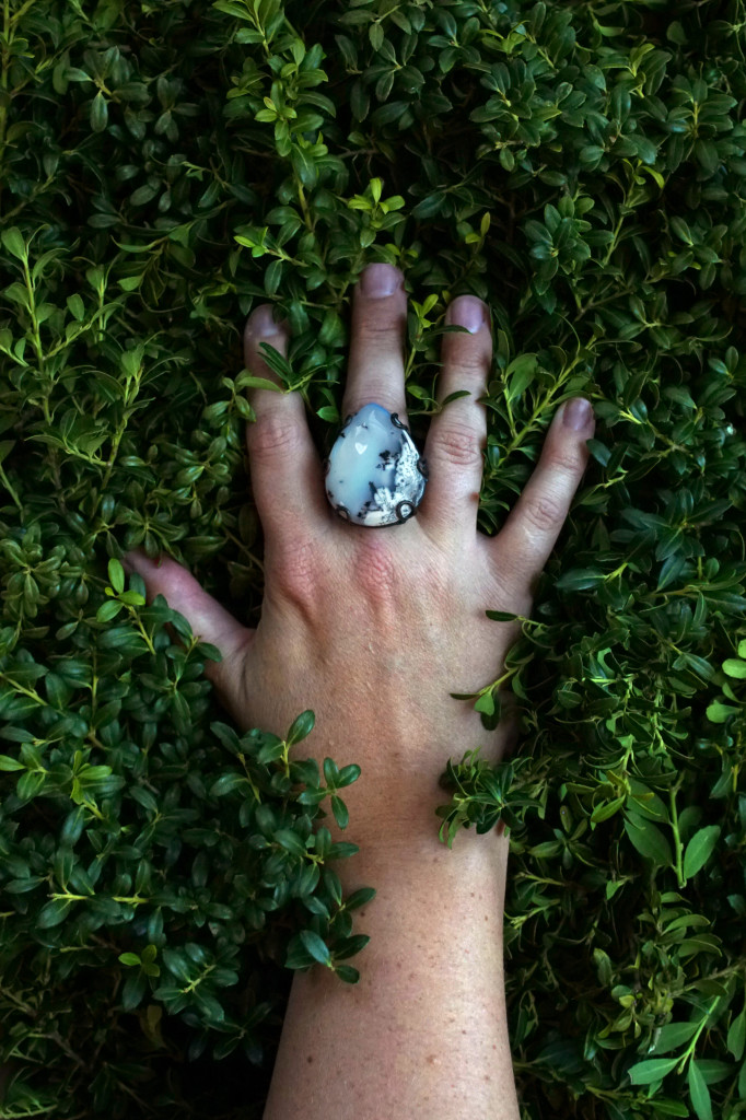 black and white statement ring with greenery