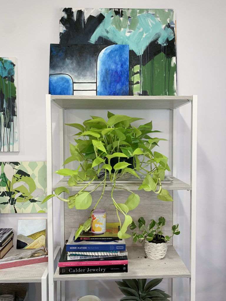 gallery wall detail with paintings and plants #shelfie #gallerywall