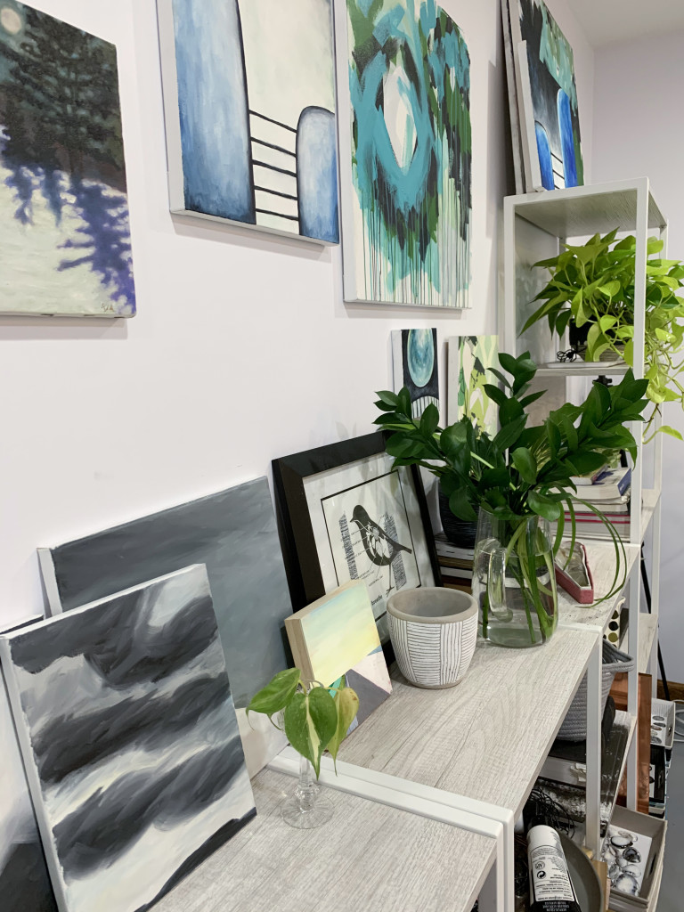 artist studio gallery wall detail with plants