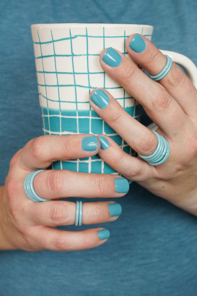 turquoise stacking rings and handmade ceramic mug