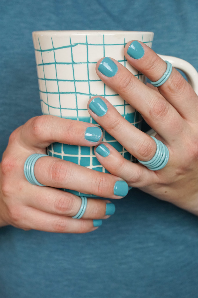 turquoise stacking rings and handmade ceramic mug