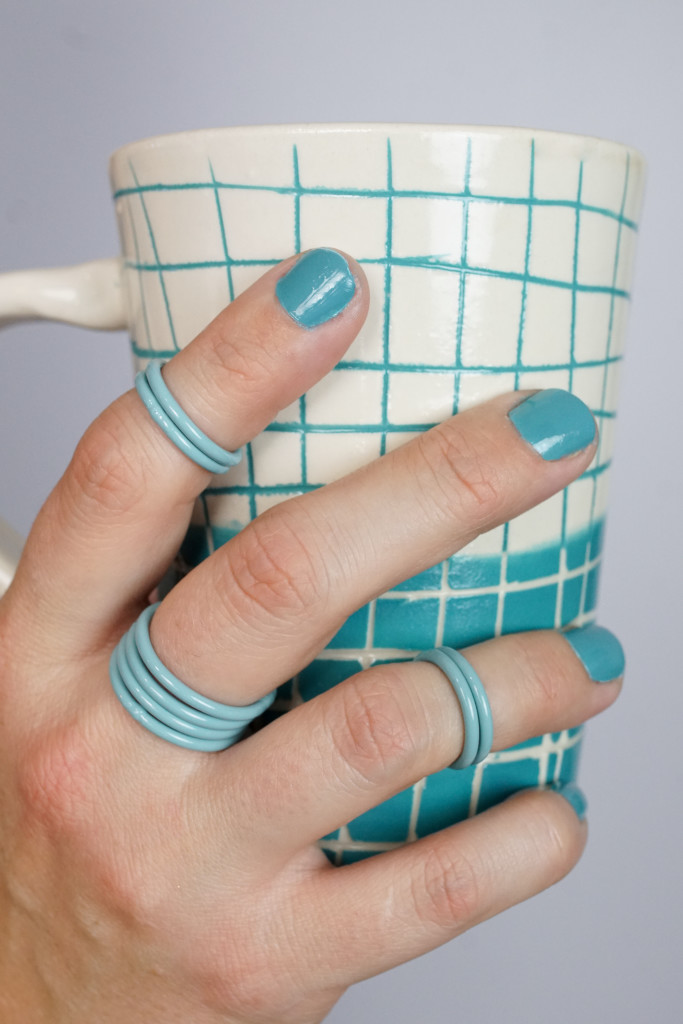 turquoise stacking rings and handmade ceramic mug