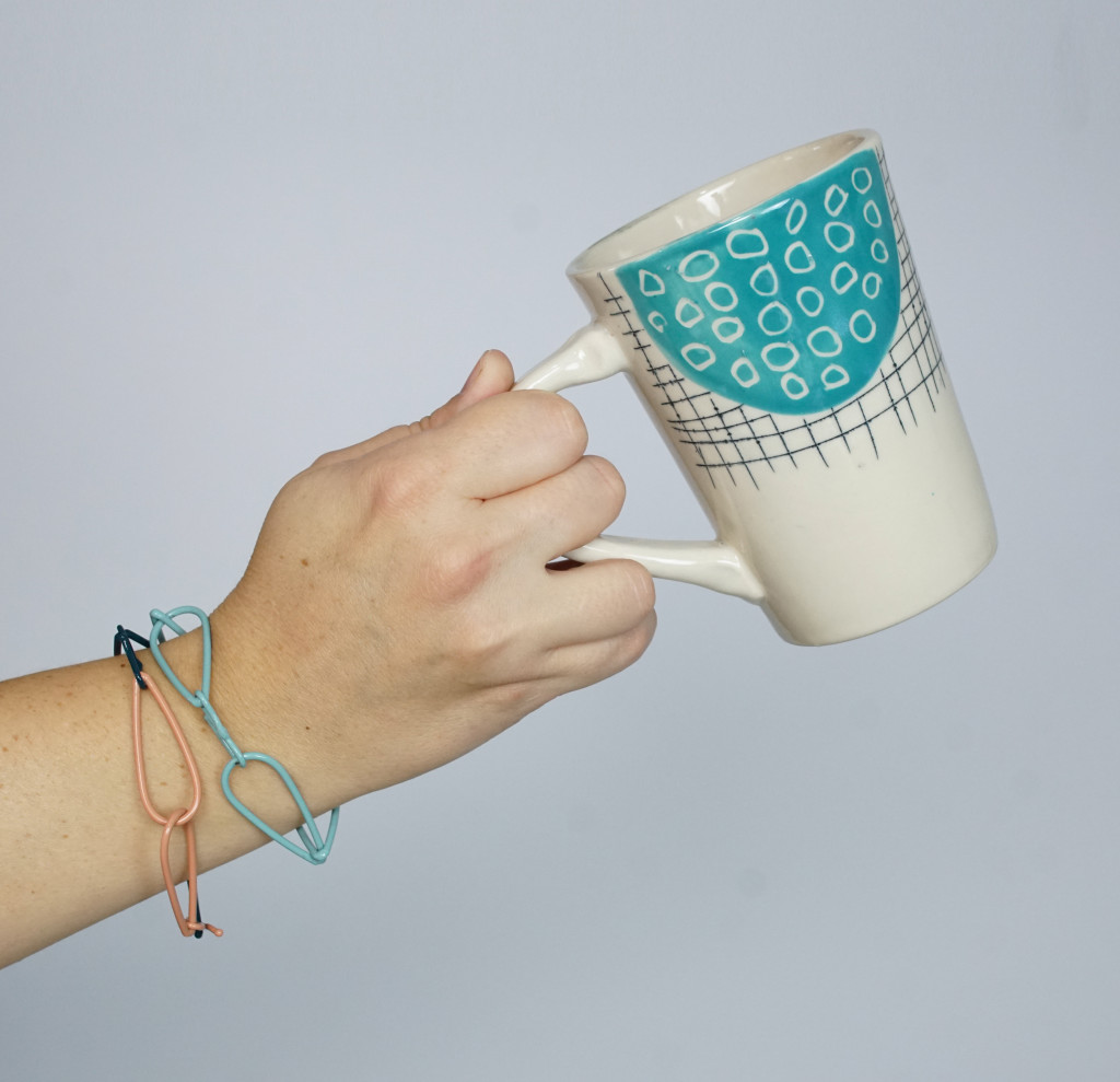 handmade mug and colorful chain bracelets
