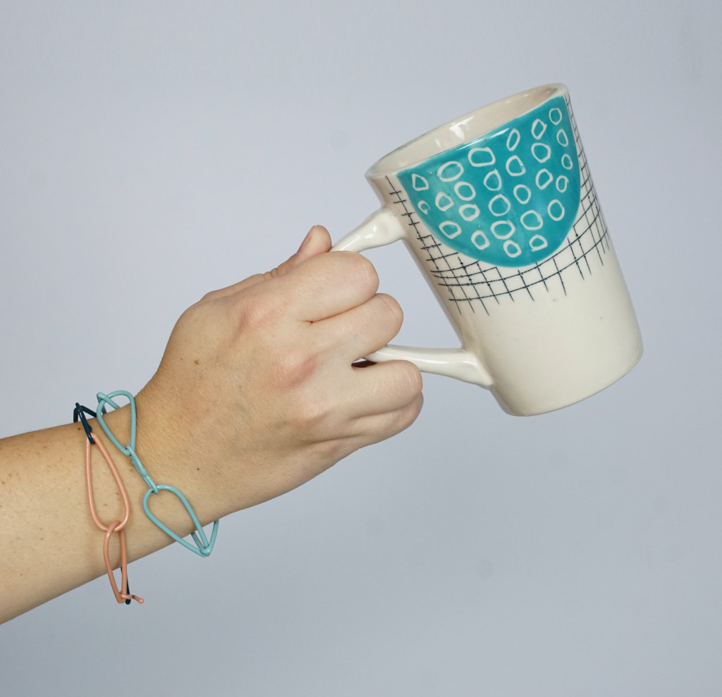 handmade mug and colorful chain bracelets