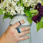 striped vase, stacking rings, and spring florals