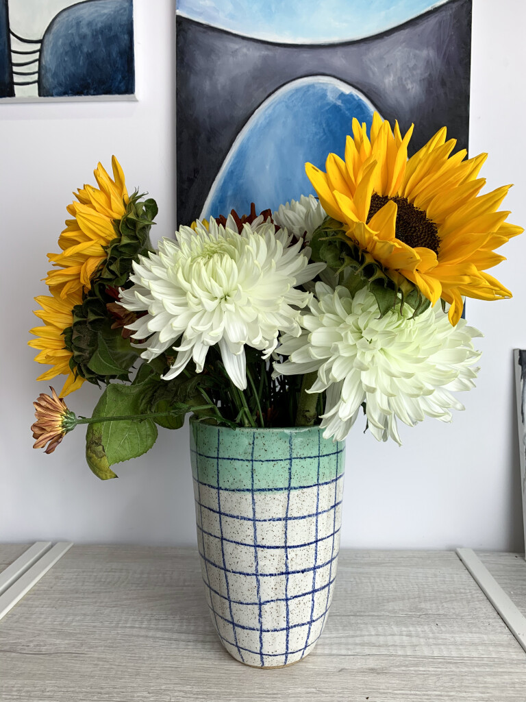 handmade ceramic vase with fall flowers and paintings