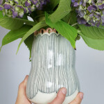 hydrangeas, a handmade vase, and stacking rings