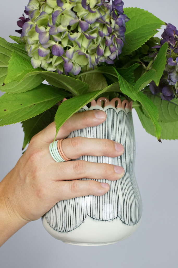 hydrangeas, a handmade vase, and stacking rings