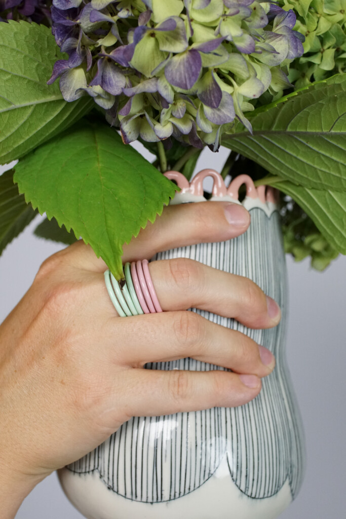 hydrangeas, a handmade vase, and stacking rings