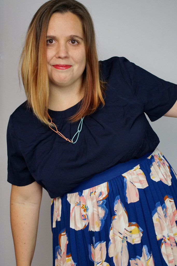 comfortable dressy outfit: floral skirt and colorful chain necklace