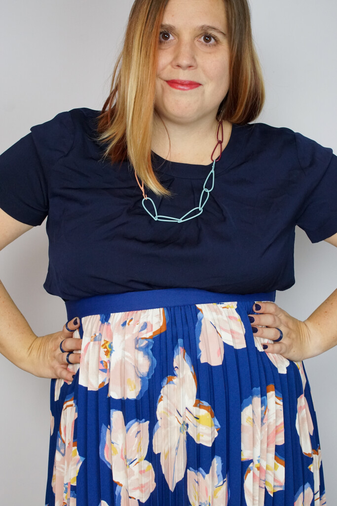 comfortable dressy outfit: floral skirt and colorful chain necklace