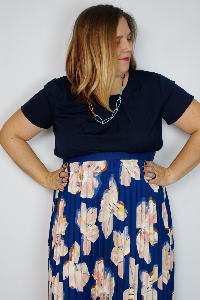 comfortable dressy outfit: floral skirt and colorful chain necklace