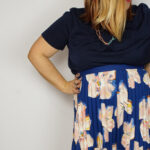 dressing up in comfort: floral midi skirt and colorful chain necklace