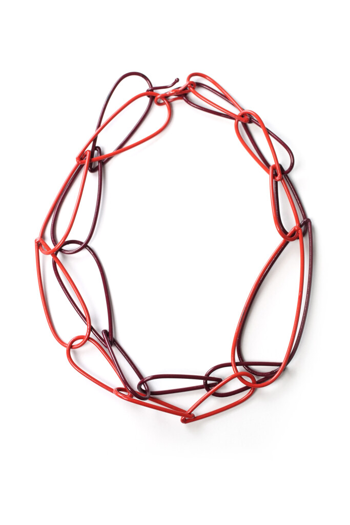 layered red and burgundy chunky chain necklaces by designer and metalsmith Megan Auman