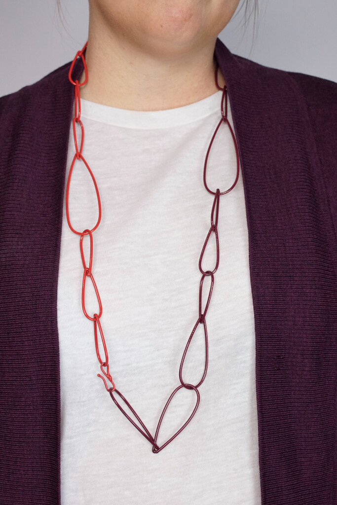 work from home style: layered red and burgundy chunky chain necklaces by designer and metalsmith Megan Auman