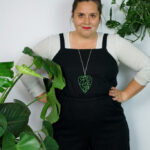 work from home style: black jumpsuit and the botanically-inspired Ada pendant