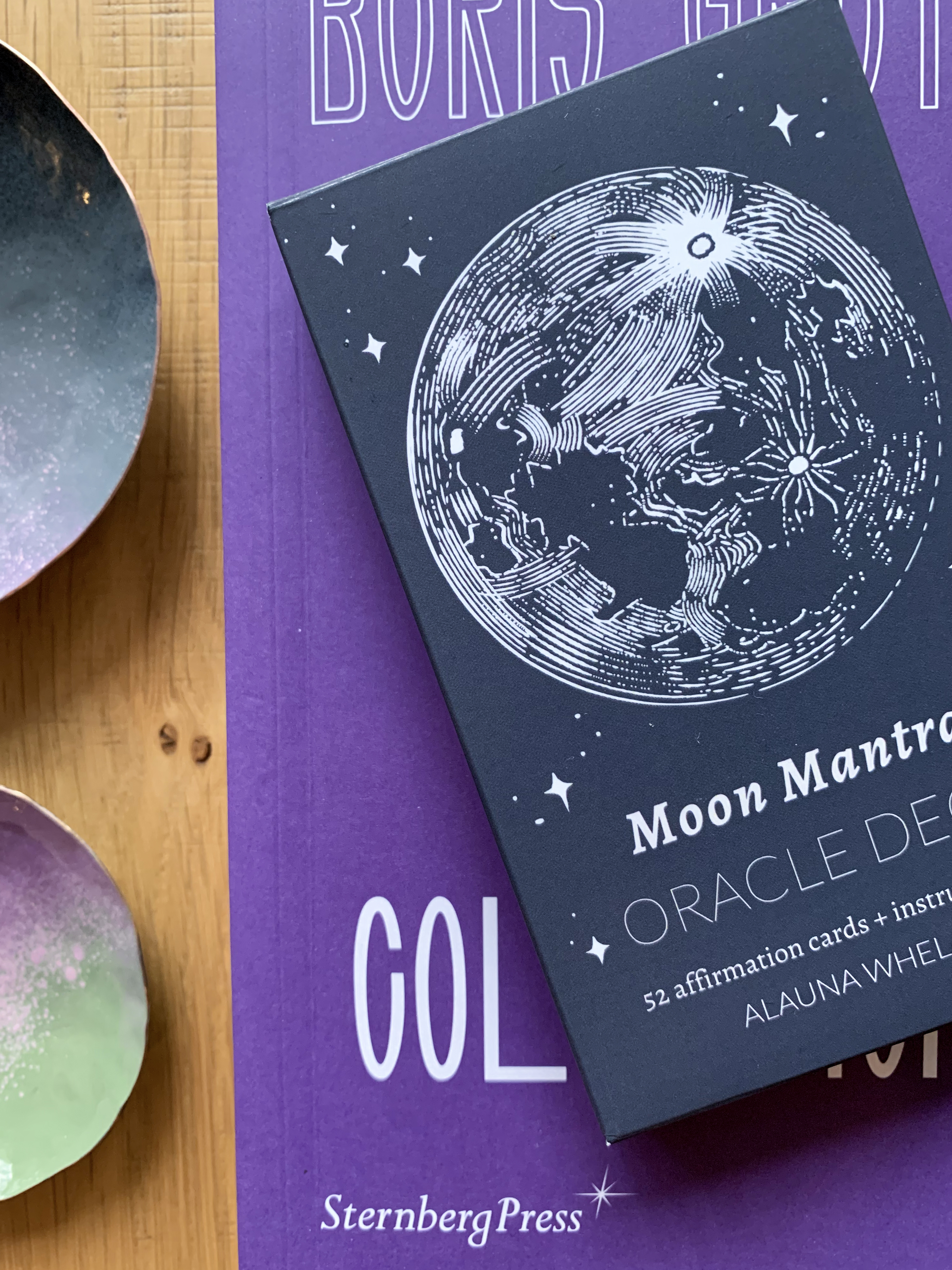 moon mantra oracle deck, book, and colorful metal dishes